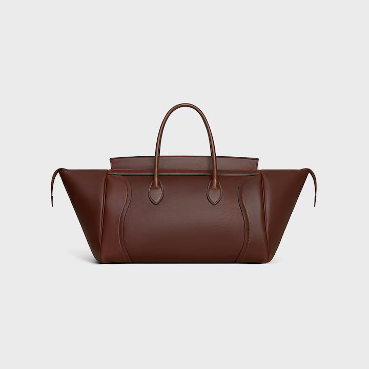 MEDIUM SMILING NEW LUGGAGE IN SUPPLE SHINY LAMBSKIN