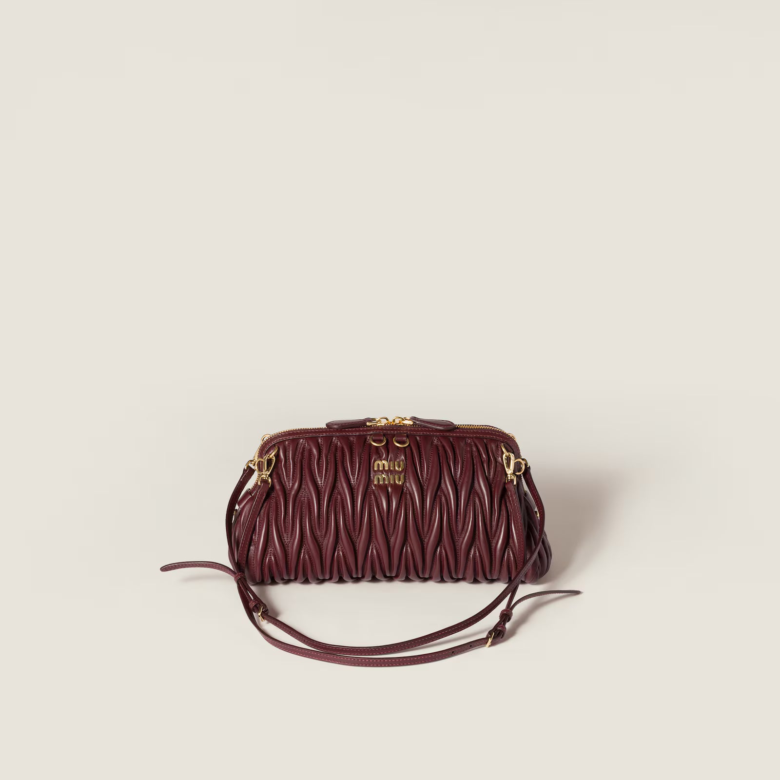 Matelassé nappa leather clutch