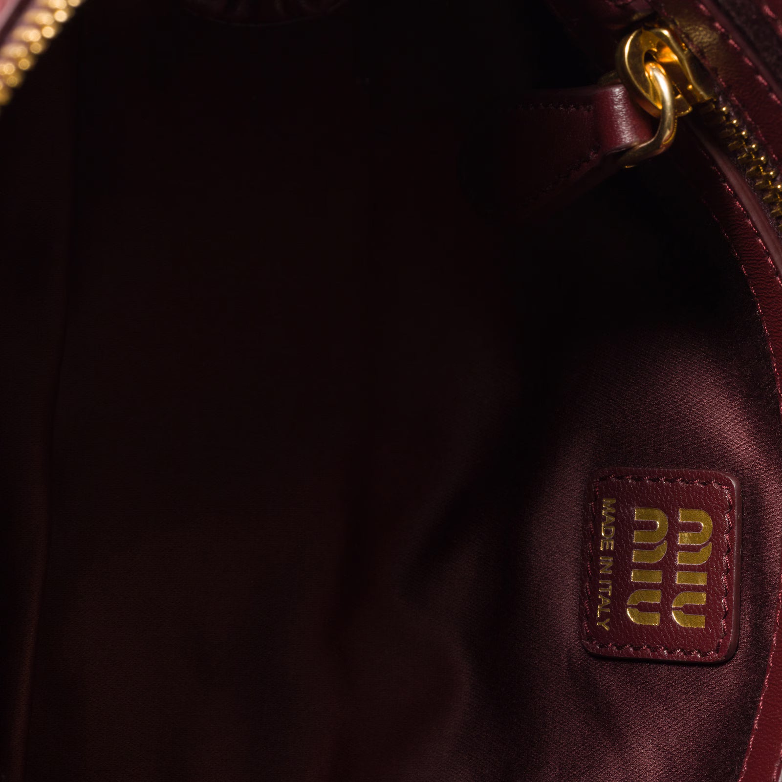 Matelassé nappa leather clutch